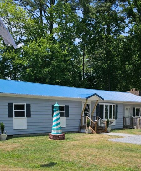 Salt Water Pines Cottage 2024 with property flag