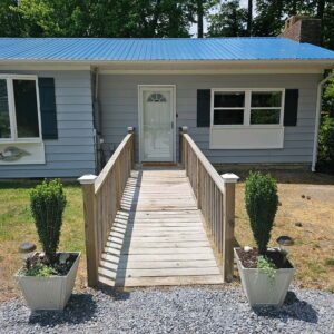 Exterior front entrance ramp to family room