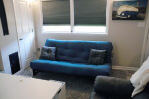 Full size futon sofa bed in family room