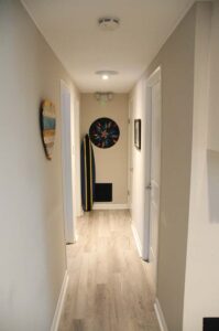 Hallway to bedrooms and main bath